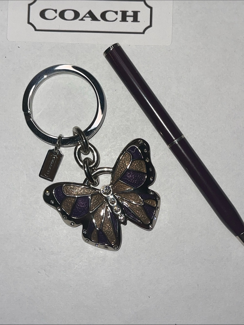 COACH Butterfly Keyring in Wine and Silver-Tone and Wine Coach Pen